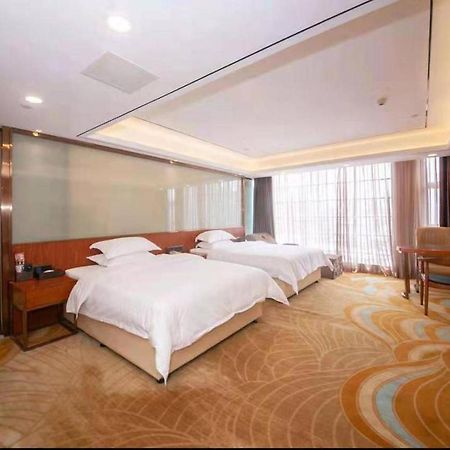 Zhongbo Art Hotel Cantón Exterior foto